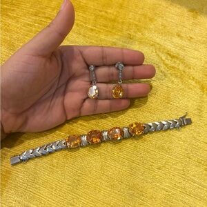Vintage Sterling   silver orange yellow faceted stones bracelet and earrings .